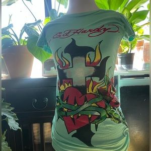 Ed Hardy and Christian Audigier women’s t-shirt. Like new condition. Never worn.